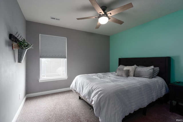 bedroom featuring ceiling fan and carpet floors