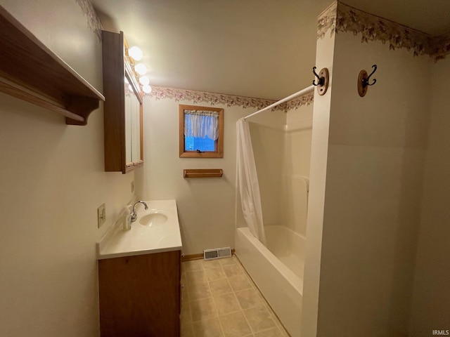 bathroom with vanity and shower / bathtub combination with curtain