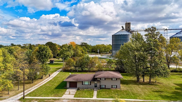 view of community with a yard