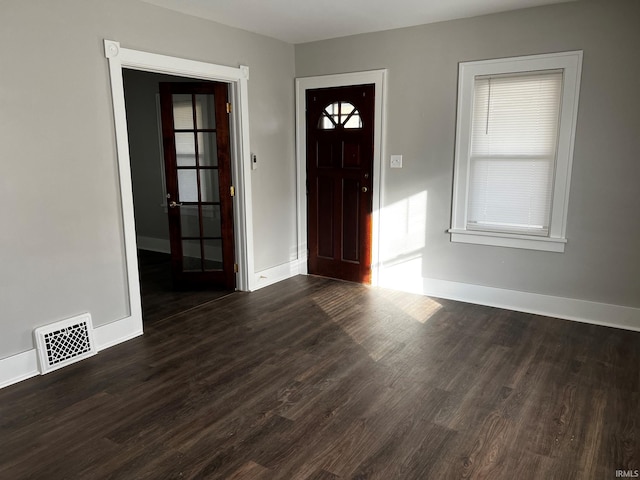 entrance foyer featuring dark hardwood / wood-style flooring