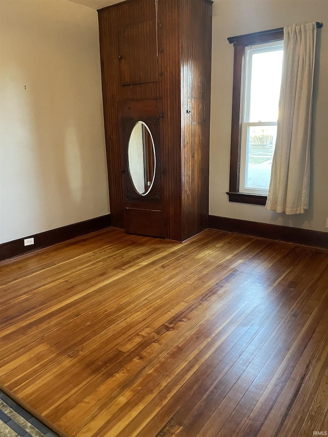 531 E 5th St, Mount Vernon, IN 47620 - unfurnished room featuring hardwood / wood-style flooring and baseboards