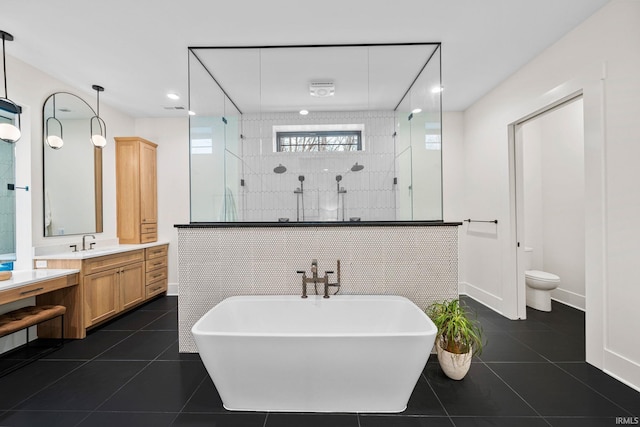 full bathroom featuring tile patterned floors, separate shower and tub, tile walls, and toilet