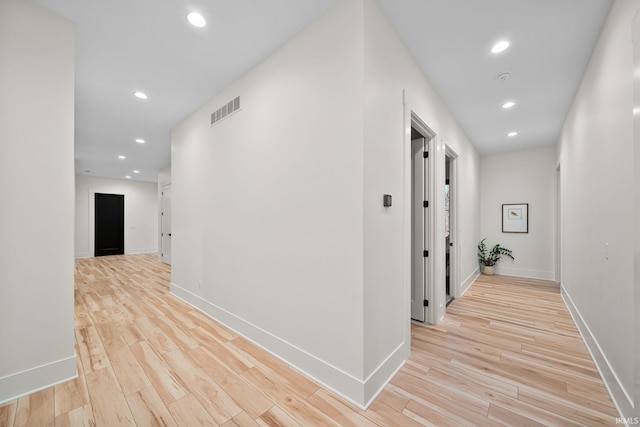 hallway featuring light wood-type flooring