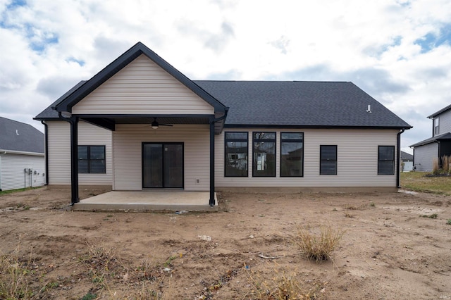 back of property with a patio and ceiling fan