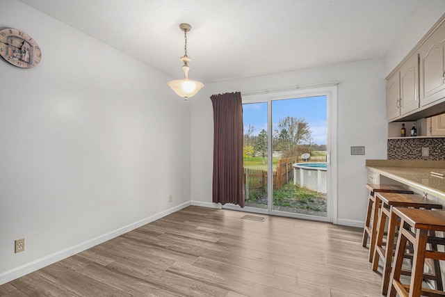 dining area featuring light hardwood / wood-style floors