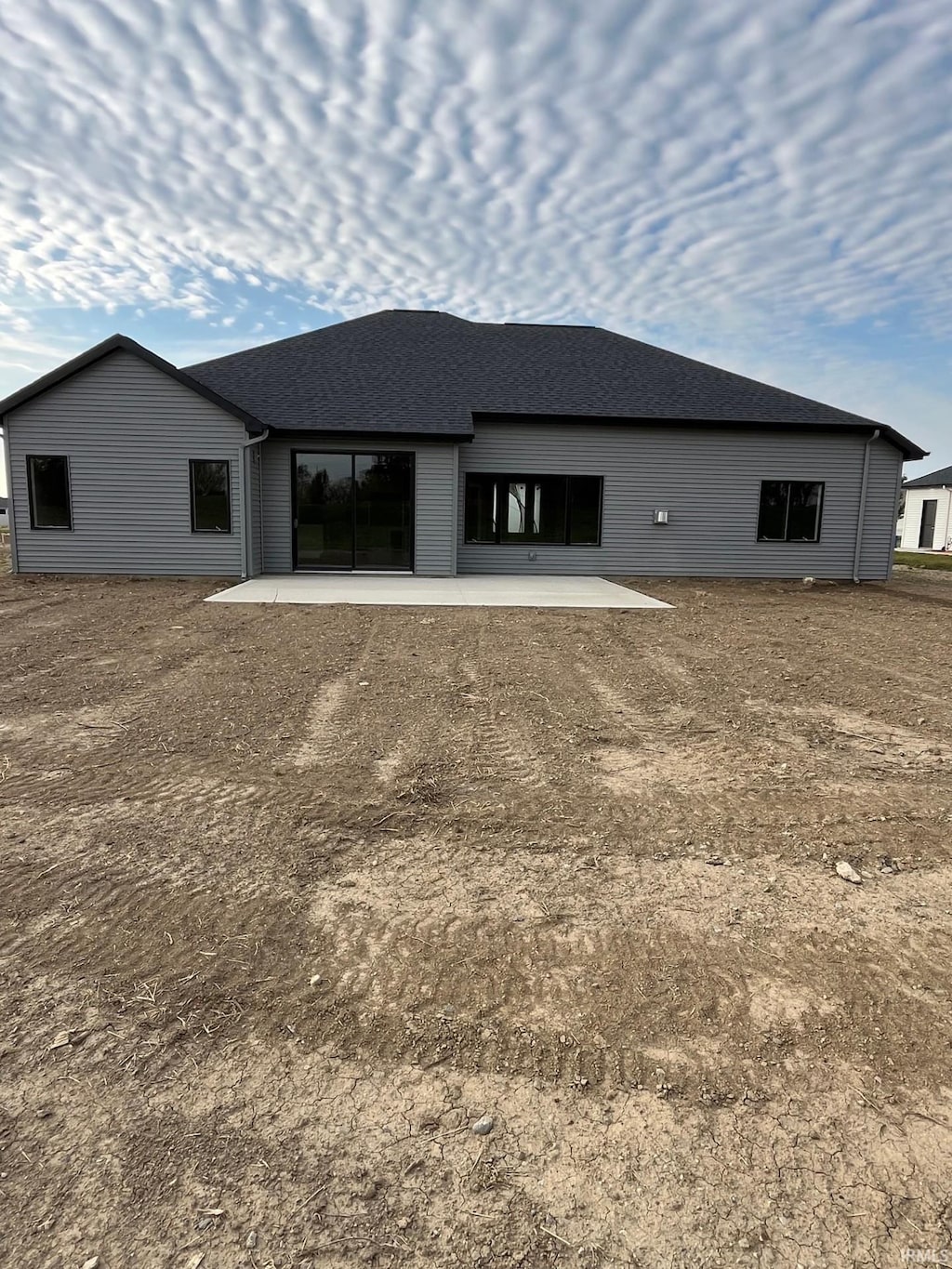 rear view of house featuring a patio area