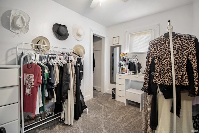 spacious closet featuring carpet and ceiling fan