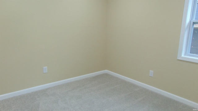 view of carpeted spare room