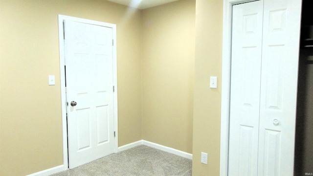 114 E Mill St, Oakland City, IN 47660 - hall with carpet floors and baseboards