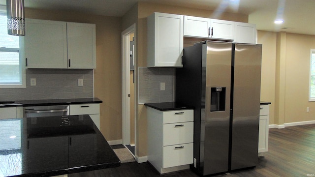 114 E Mill St, Oakland City, IN 47660 - kitchen with stainless steel fridge with ice dispenser, dark wood-style floors, decorative backsplash, white cabinets, and recessed lighting