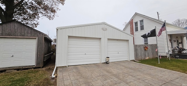 garage with a yard