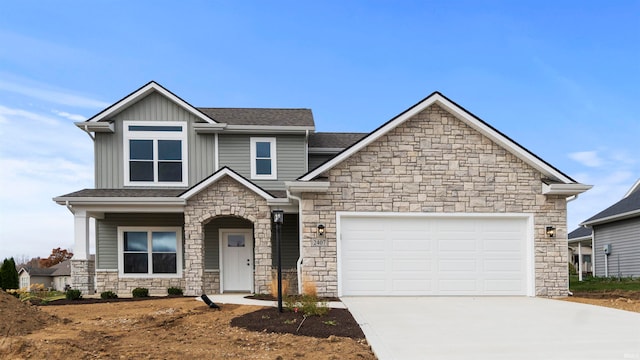 craftsman house with a garage