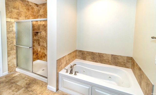 bathroom with tile patterned flooring and plus walk in shower