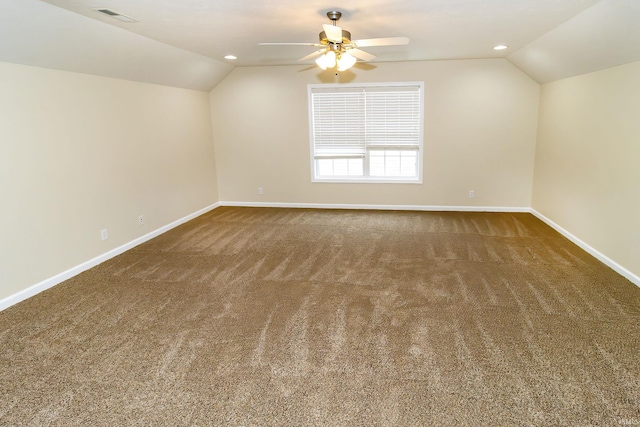 additional living space featuring ceiling fan, carpet floors, and lofted ceiling