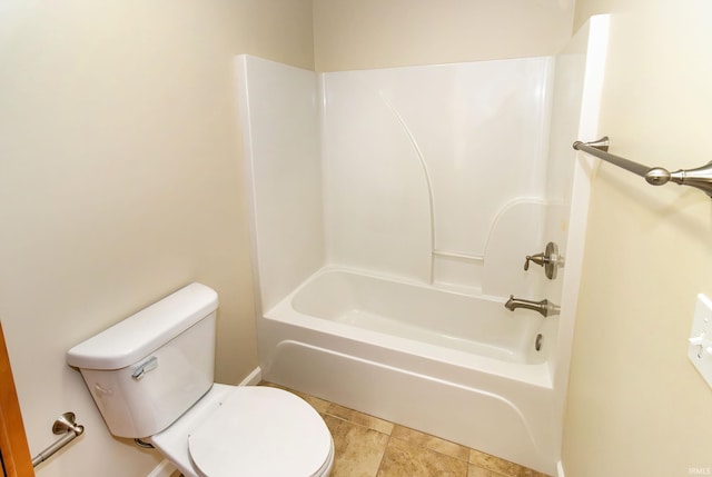 bathroom with shower / tub combination and toilet