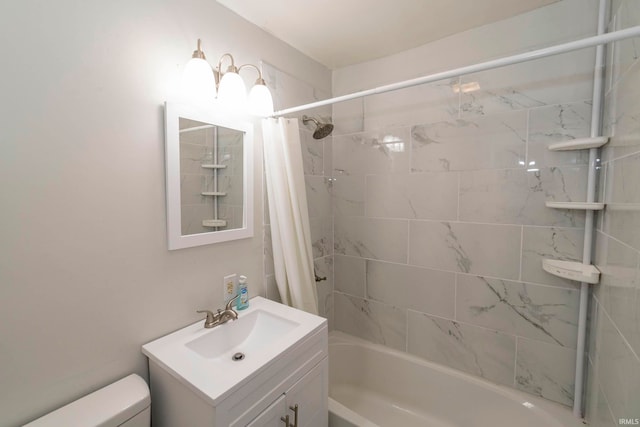 full bathroom with vanity, toilet, and shower / tub combo with curtain