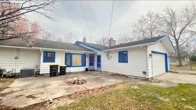 back of property featuring a patio and central AC unit