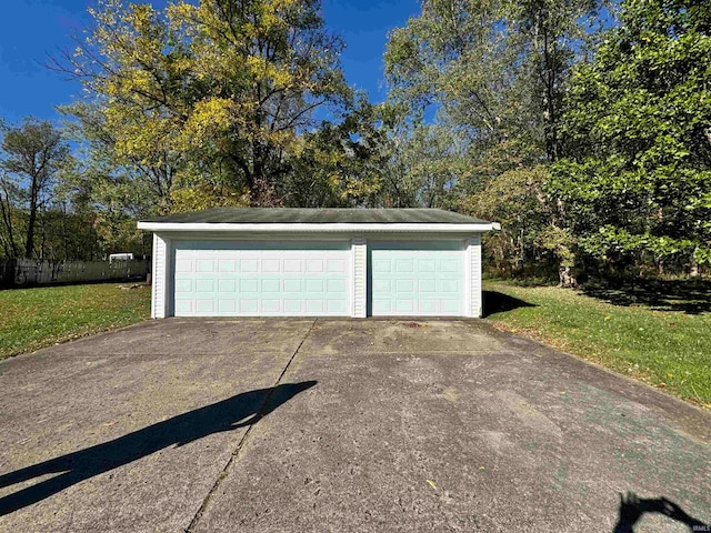 garage with a lawn