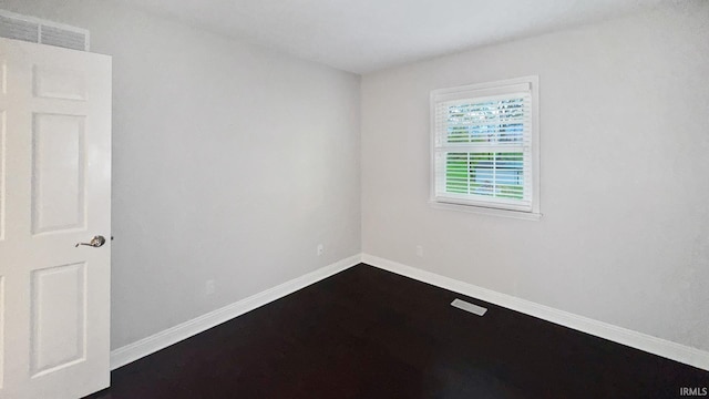 6777 Oak Grove Rd, Newburgh, IN 47630 - empty room featuring baseboards and dark wood-style floors