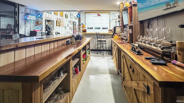 6777 Oak Grove Rd, Newburgh, IN 47630 - bar area featuring a workshop area and concrete flooring