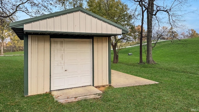 garage with a yard