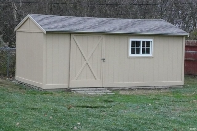 view of outdoor structure with a yard