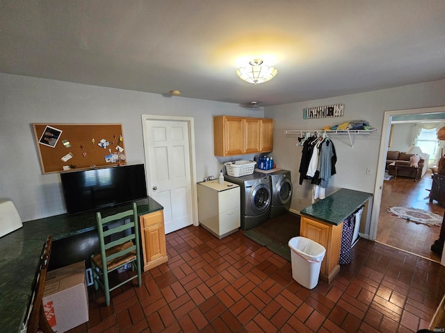 laundry room with cabinets and washing machine and dryer