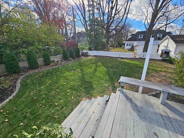 view of yard featuring a wooden deck