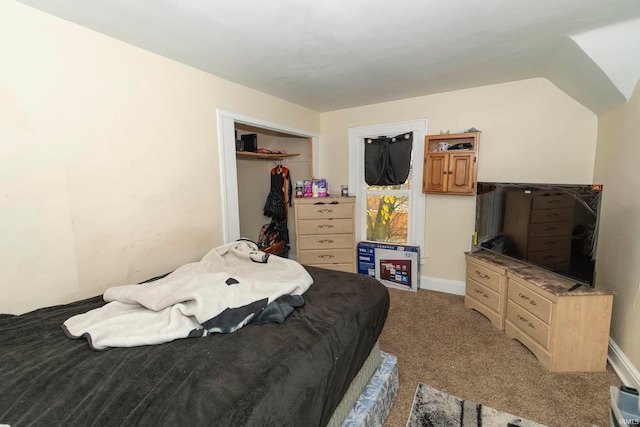 carpeted bedroom with a closet