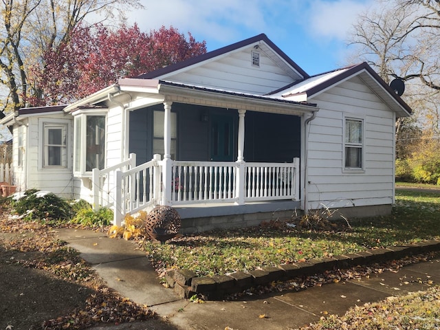 bungalow-style home featuring a porch