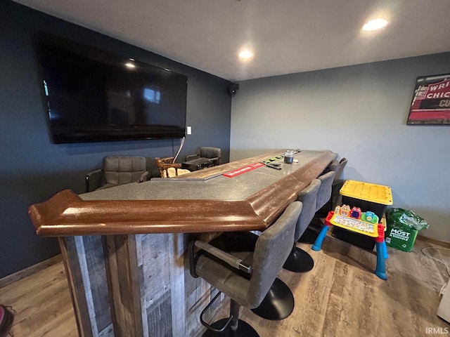 bar featuring wood-type flooring