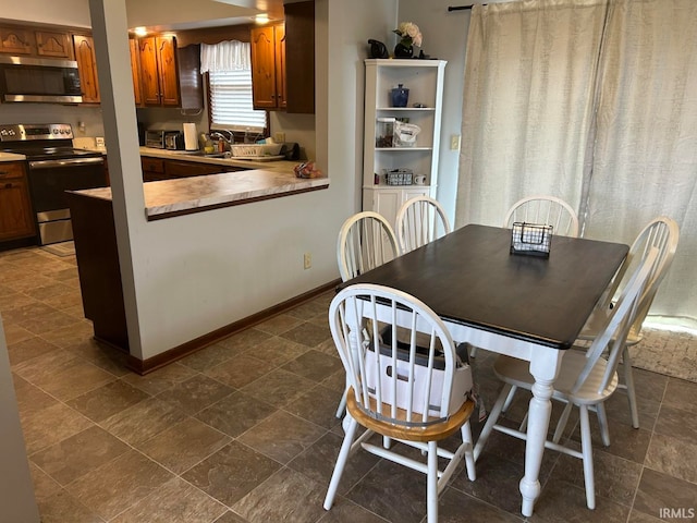 dining room with sink