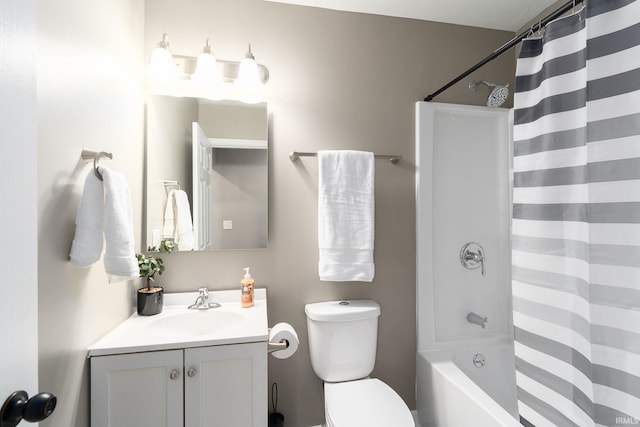 full bathroom with toilet, vanity, and shower / tub combo with curtain