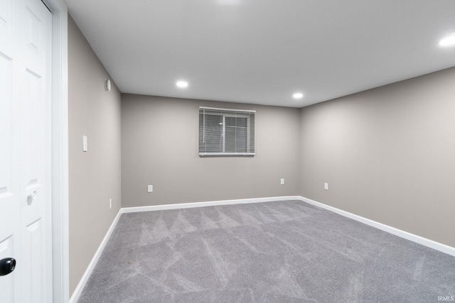 basement featuring carpet flooring