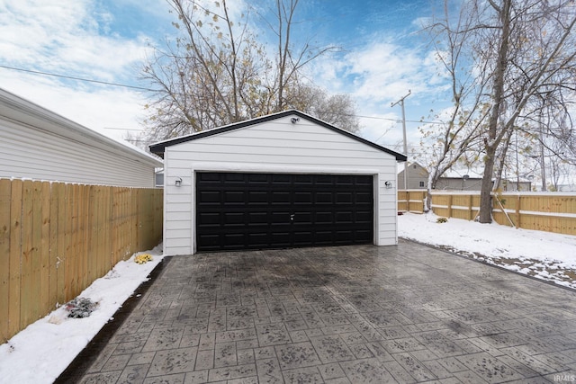 view of snow covered garage