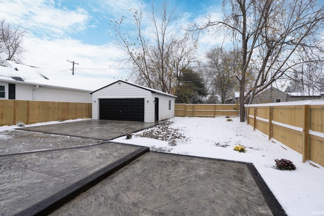 view of snow covered garage