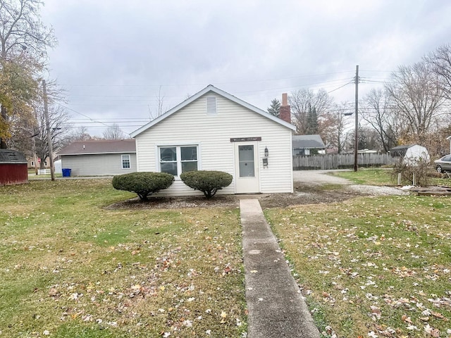 exterior space with a front lawn