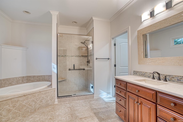 bathroom featuring tile patterned flooring, vanity, crown molding, and plus walk in shower