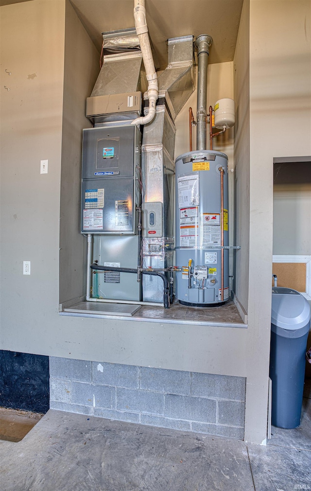 utility room featuring gas water heater