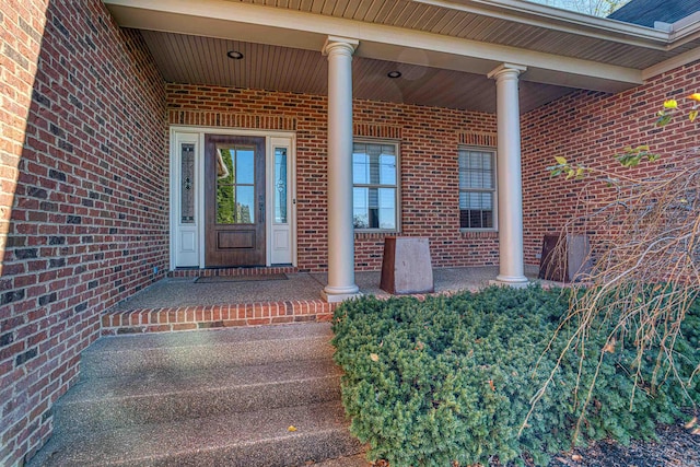 doorway to property with covered porch