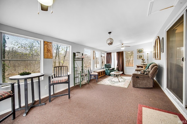 sunroom / solarium with ceiling fan