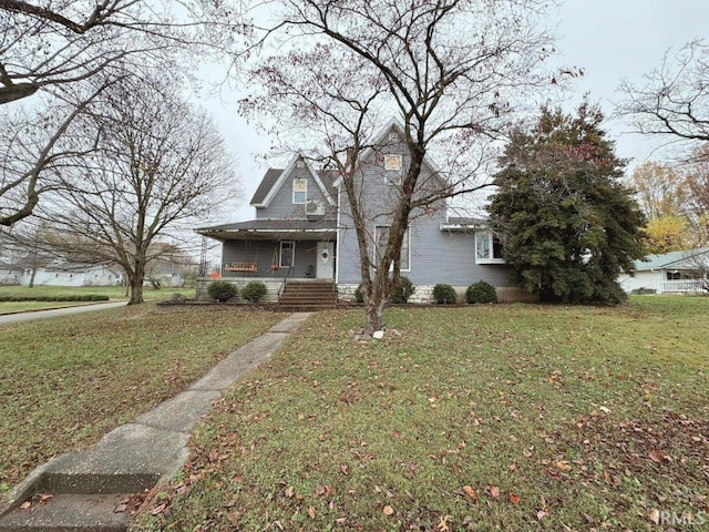 view of front of house featuring a porch and a front yard