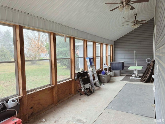 sunroom / solarium with ceiling fan and lofted ceiling