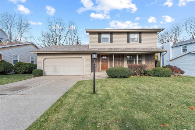 front facade with a front yard and a garage