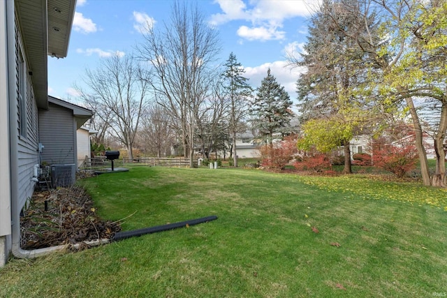 view of yard featuring central AC unit