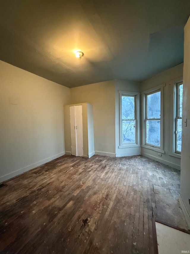 spare room featuring hardwood / wood-style flooring