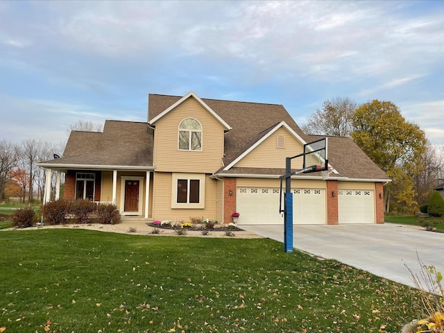 415 W 060 N, Lagrange, IN 46761 - traditional-style house with a front lawn, a garage, concrete driveway, a porch, and brick siding
