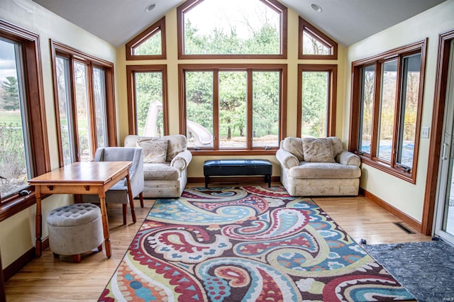 415 W 060 N, Lagrange, IN 46761 - living area with lofted ceiling, plenty of natural light, baseboards, and light wood finished floors
