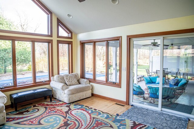 415 W 060 N, Lagrange, IN 46761 - sunroom / solarium with wood finished floors, high vaulted ceiling, and baseboards
