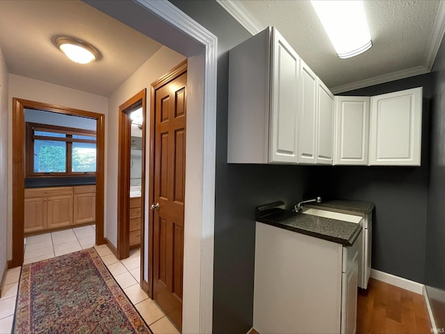 415 W 060 N, Lagrange, IN 46761 - washroom featuring baseboards, light tile patterned flooring, and ornamental molding